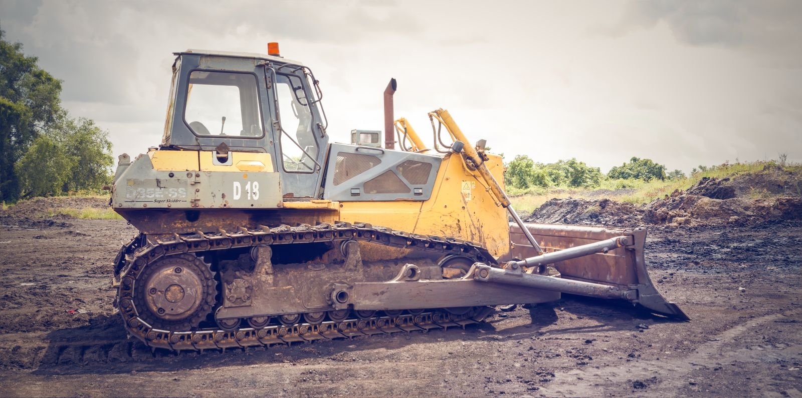 Heavy machinery working on rough ground